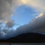 Some blue sky and sunlight through the clouds over Mt Oberon